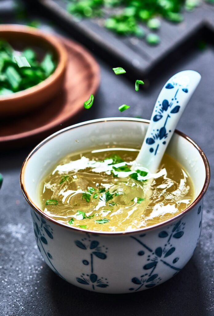 a bowl of soup with a spoon